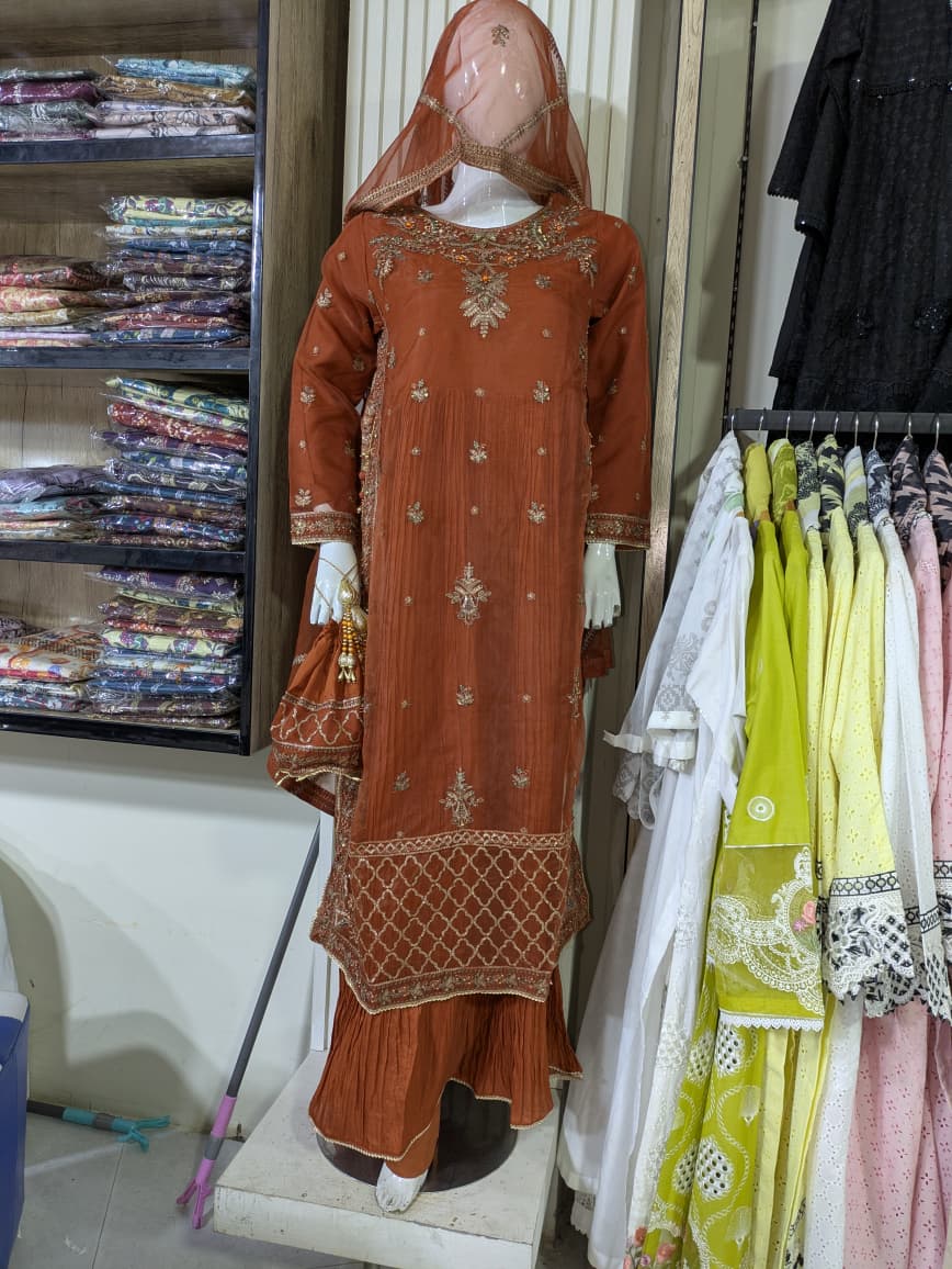 Elegant Rust-Orange Embroidered Sharara Suit with Sheer Dupatta