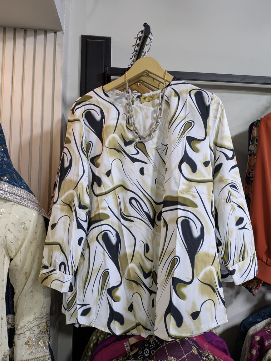 Modern Graphic Tunic with Statement Chain Detail